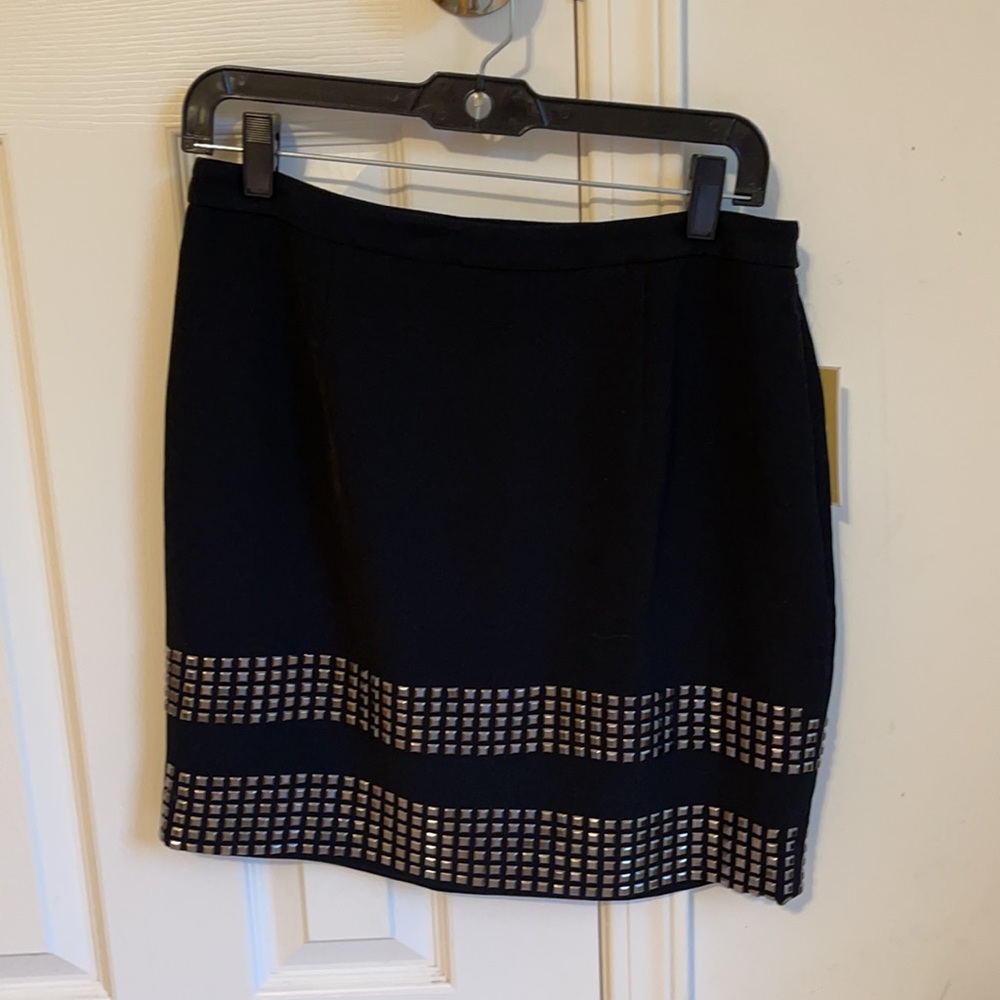 Brand: Michael Kors Color: Black with silver embellishments Size: 8